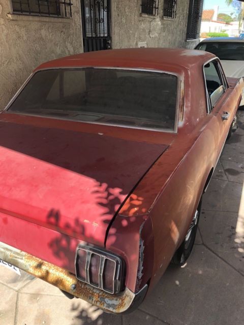 1965 Red Ford Mustang Coupe