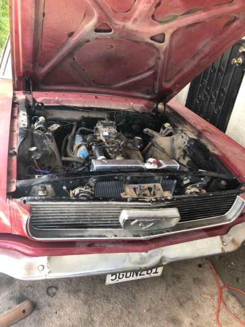 1965 Red Ford Mustang Coupe