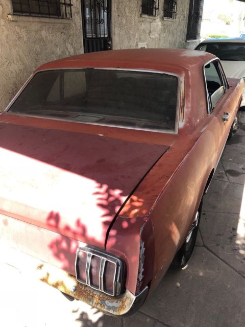 1965 Red Ford Mustang Coupe