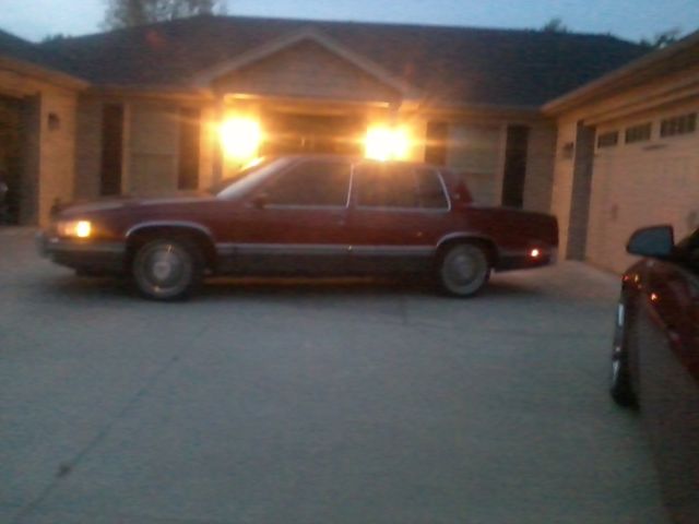 1991 Red Cadillac DeVille Sedan