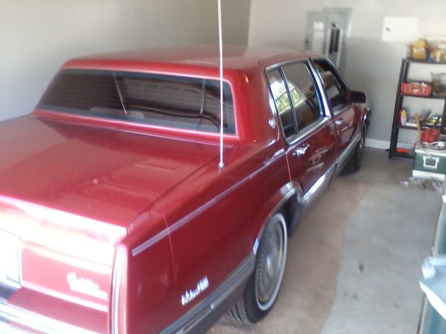 1991 Red Cadillac DeVille Sedan