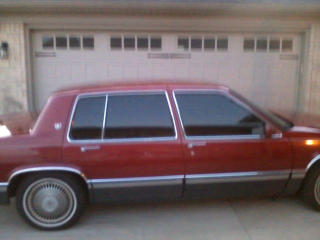 1991 Red Cadillac DeVille Sedan