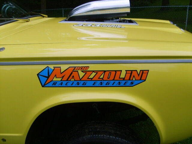 1964 yellow with ram charger stripes Dodge Dart 2 door sedan