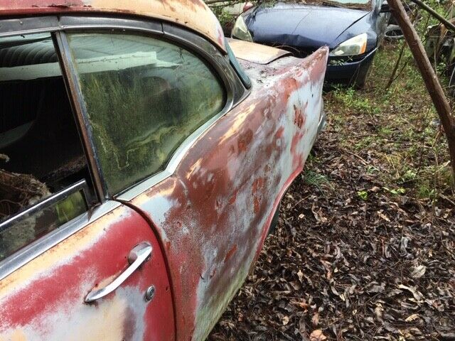 1957 Red Chevrolet Bel Air/150/210 Coupe