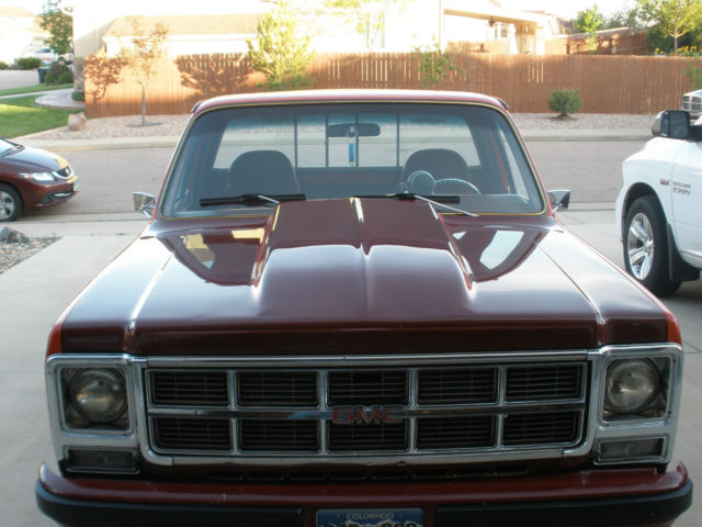 1979 Red and Burgendy GMC Sierra 1500 Step Side Pick up