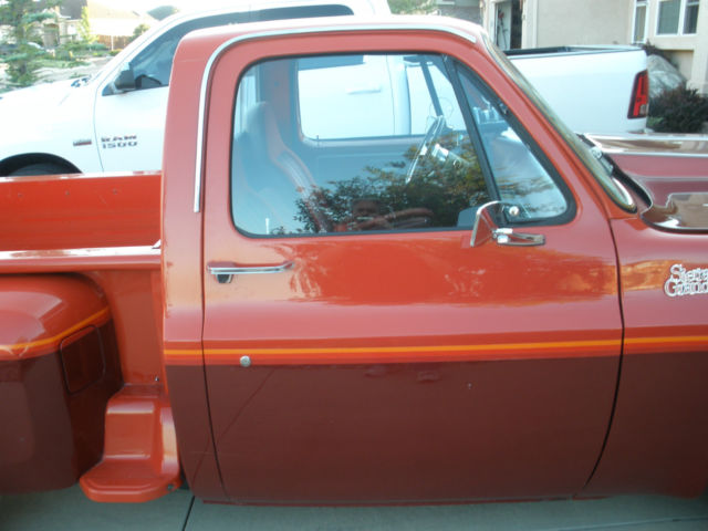1979 Red and Burgendy GMC Sierra 1500 Step Side Pick up