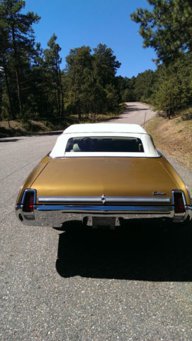 1969 Gold Oldsmobile Cutlass Convertible