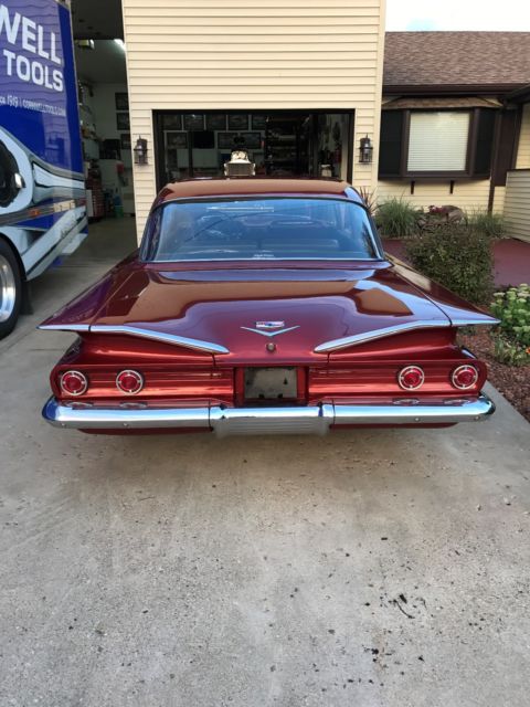 1960 Red Chevrolet Impala Sedan