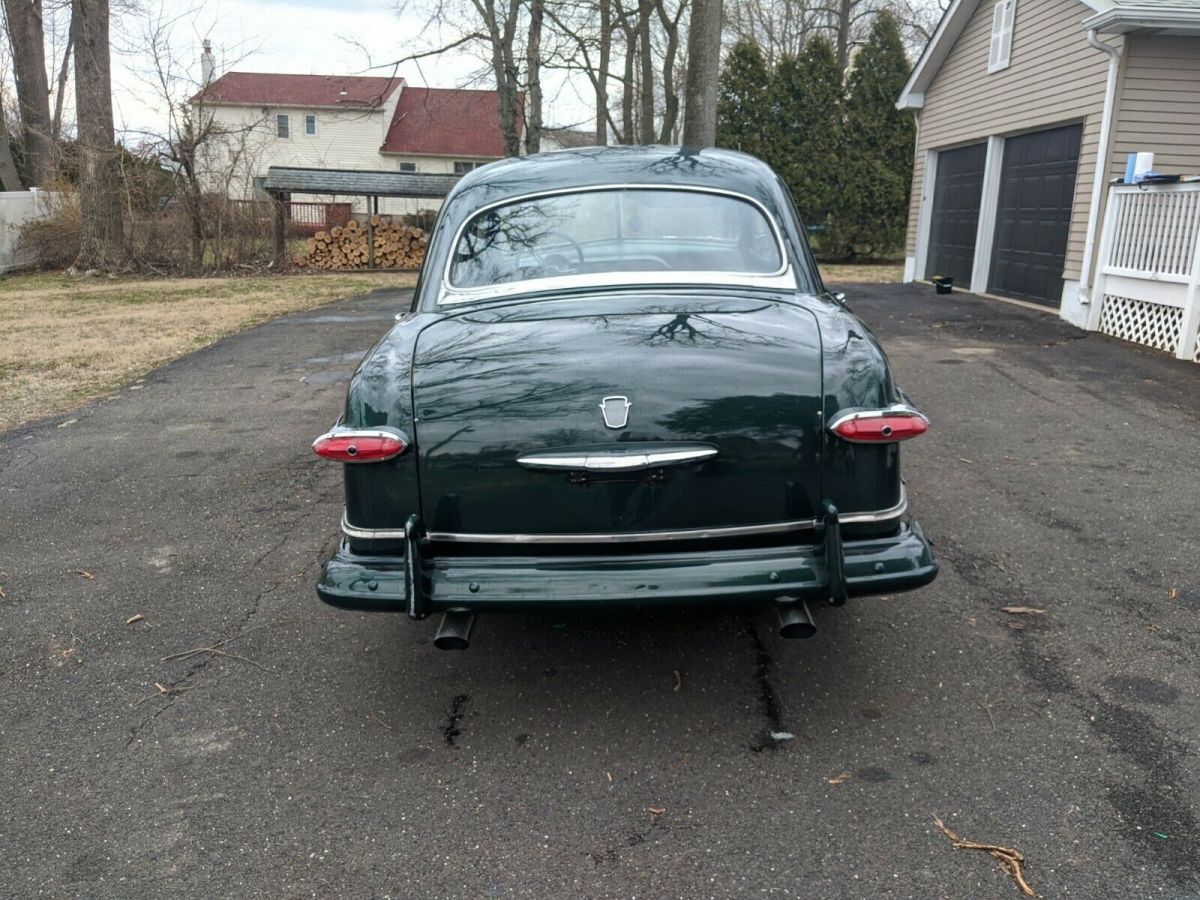 1951 Green Ford Deluxe Sedan