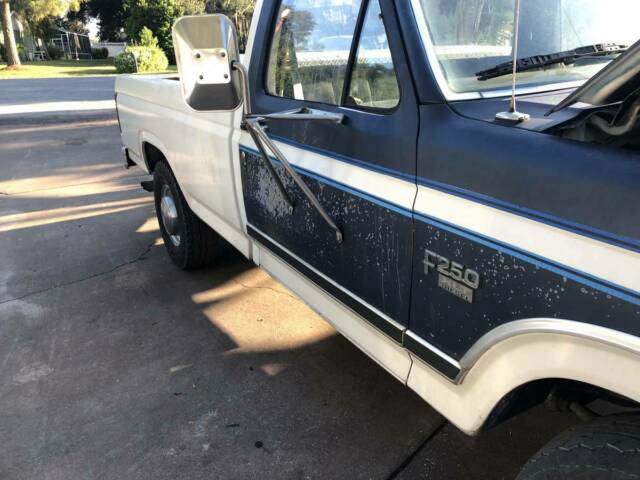 1986 blue and white Ford F-250