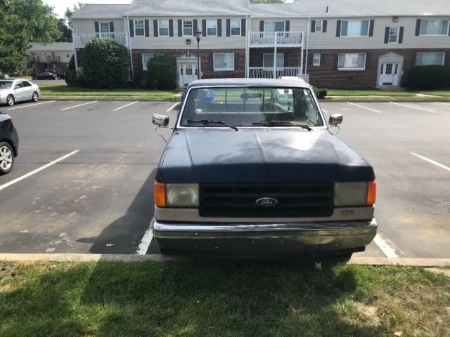 1987 Blue Ford F-150 Standard Cab Pickup