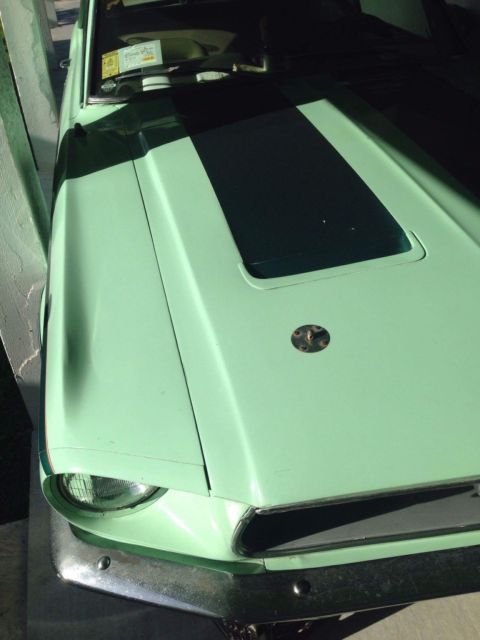 1967 Green , with dark green stripes Ford Mustang Coupe