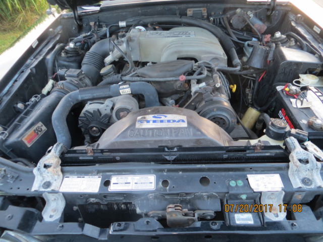 1992 black Ford Mustang Convertible
