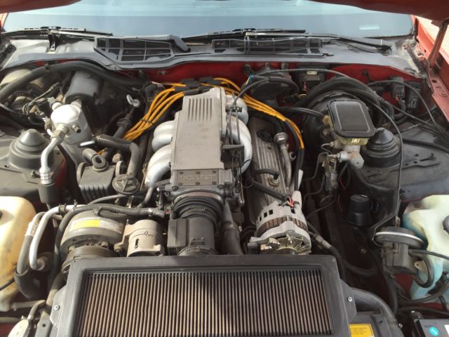 1989 Orange Pontiac Trans Am Coupe
