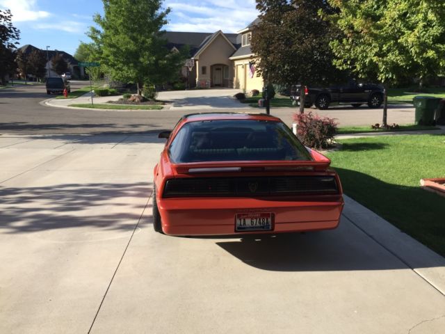 1989 Orange Pontiac Trans Am Coupe