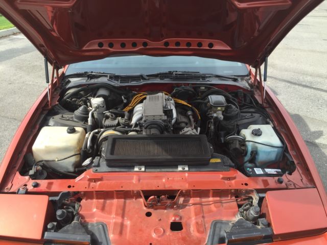 1989 Orange Pontiac Trans Am Coupe