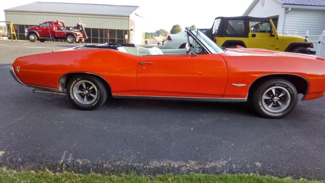 1964 custom (burgundy) Pontiac GTO Convertible