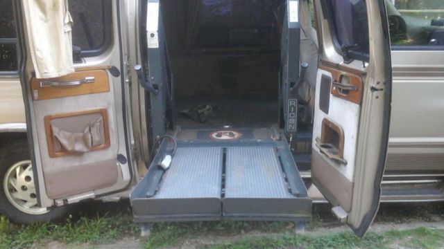 1992 Tan Ford E-Series Van Handicap Van