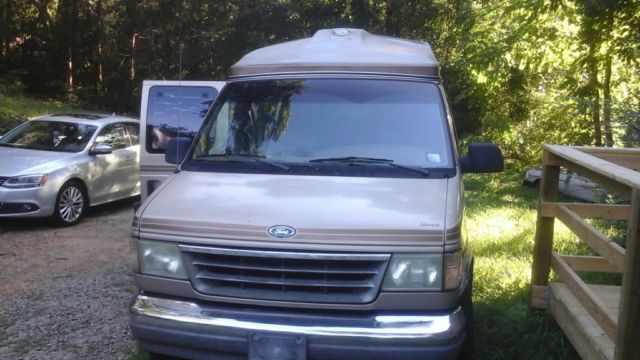 1992 Tan Ford E-Series Van Handicap Van
