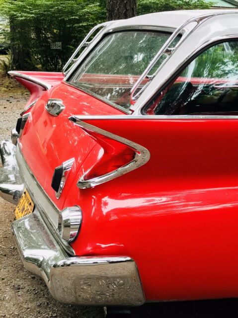 1961 Red and White Chrysler Newport Wagon
