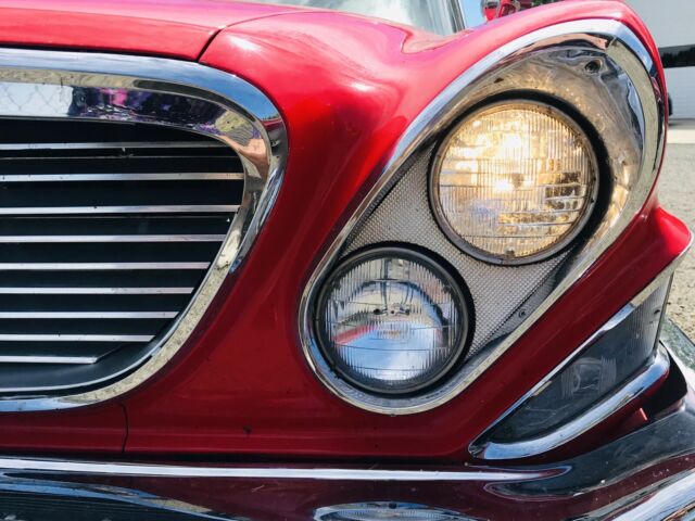1961 Red and White Chrysler Newport Wagon