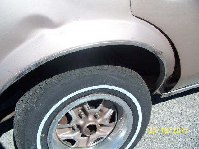 1984 lt.brown Oldsmobile Cutlass Sedan