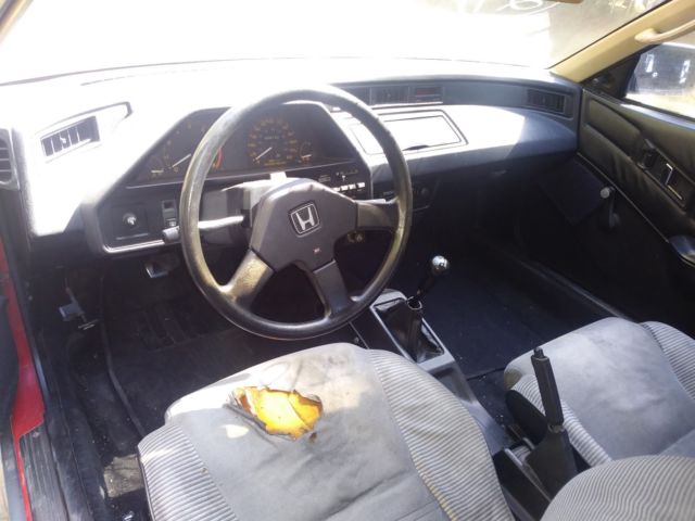 1985 red Honda CRX Coupe