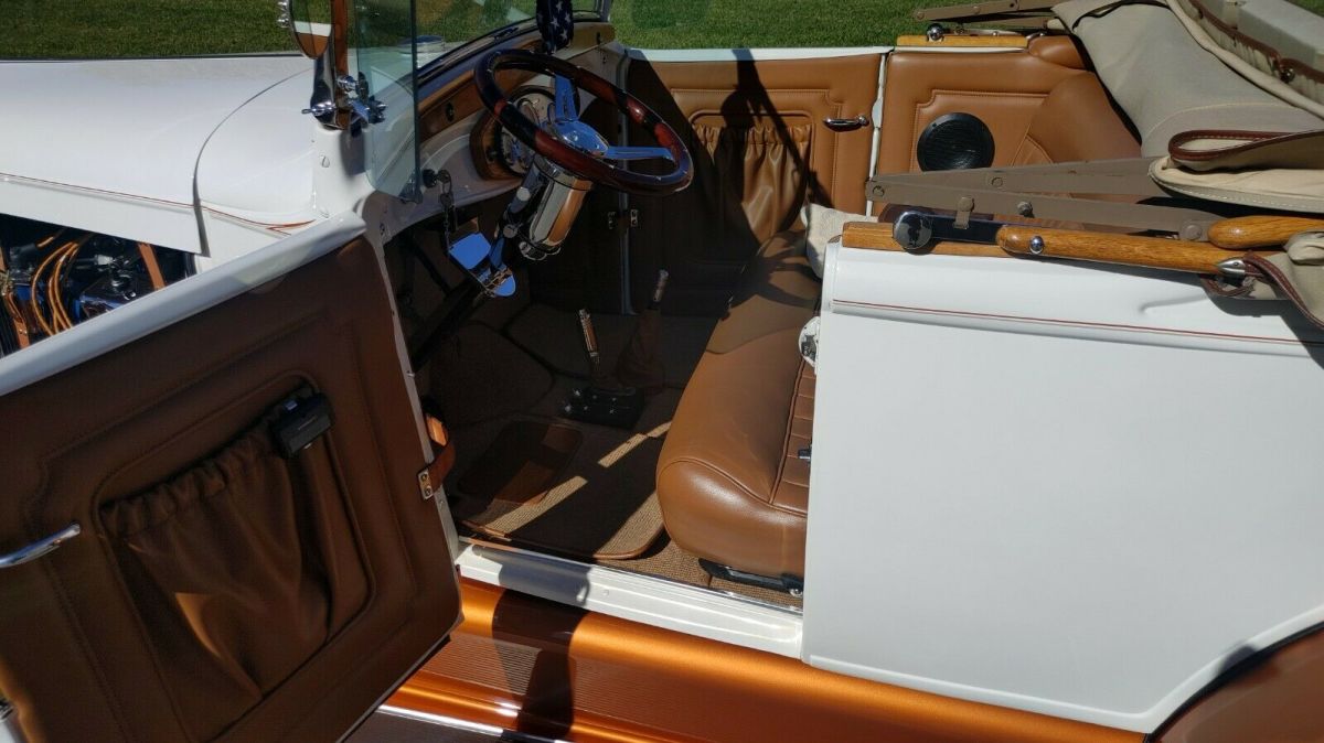 1929 Pearl white/ Tangerine metallic Ford Model A Convertible