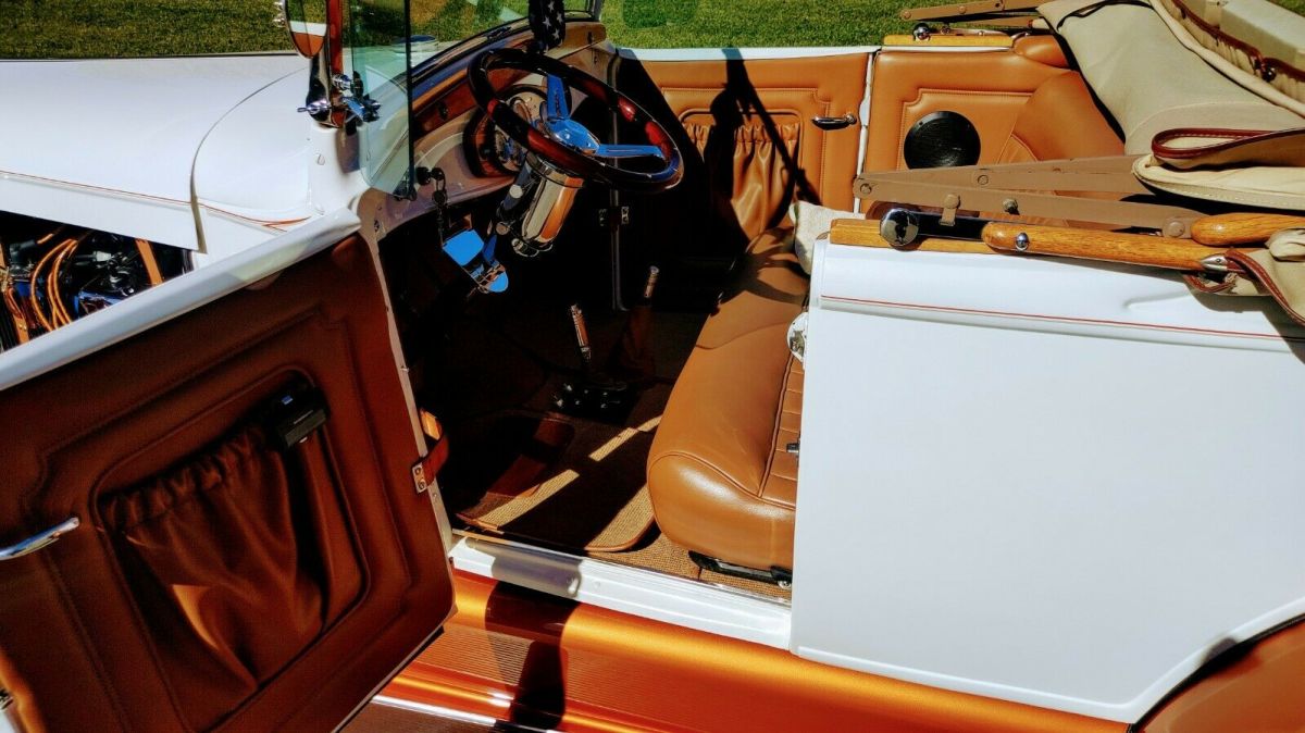 1929 Pearl white/ Tangerine metallic Ford Model A Convertible
