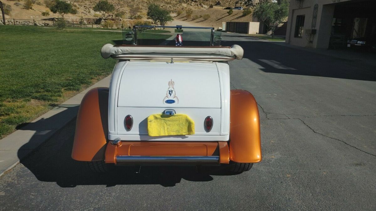 1929 Pearl white/ Tangerine metallic Ford Model A Convertible