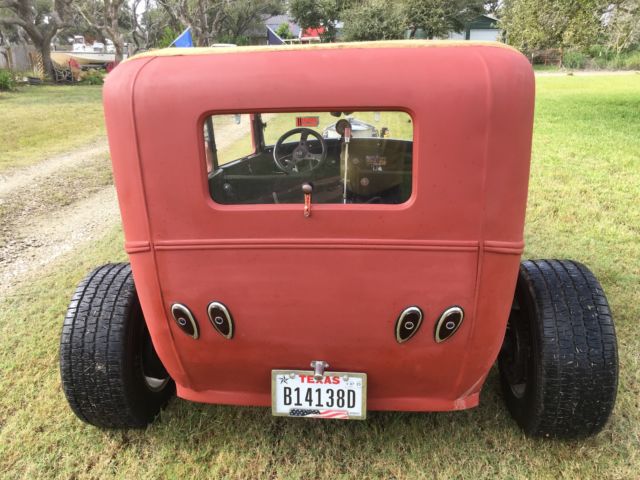 1929 red primer Ford Model A 2dr
