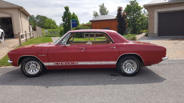 1965 Red Chevrolet Corvair Sedan