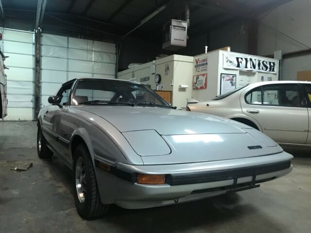 1982 silver gray Mazda RX-7 coupe