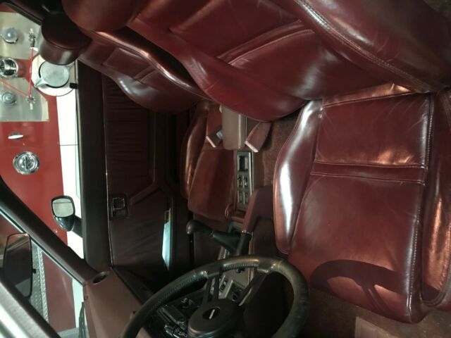 1982 silver gray Mazda RX-7 coupe