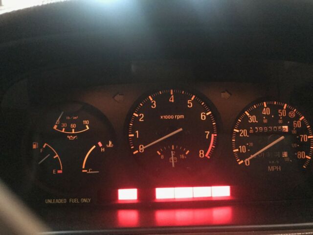 1982 silver gray Mazda RX-7 coupe