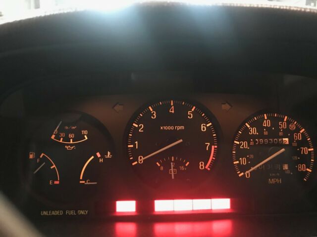 1982 silver gray Mazda RX-7 coupe