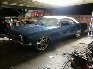 1965 metlic sliver Chevrolet Impala Coupe