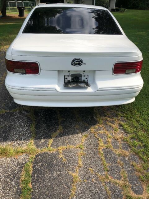 1994 White Chevrolet Impala Sedan