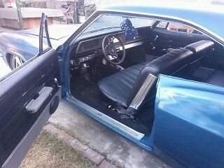 1965 metlic sliver Chevrolet Impala Coupe