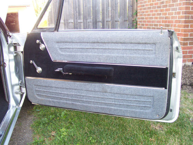 1965 metlic sliver Chevrolet Impala Coupe