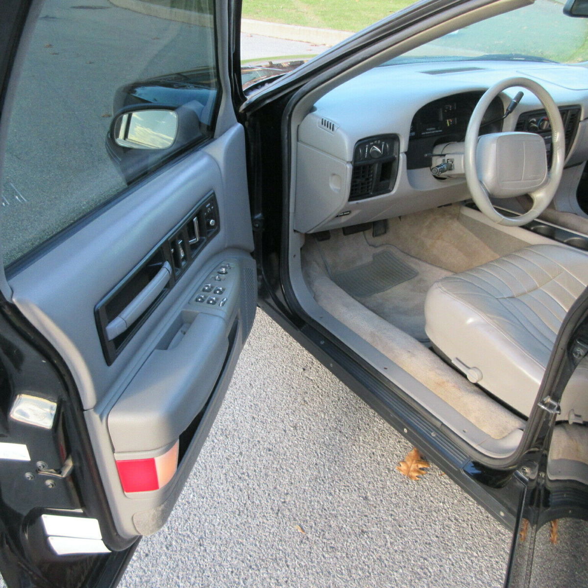 1994 Black Chevrolet Impala 4 door sedan