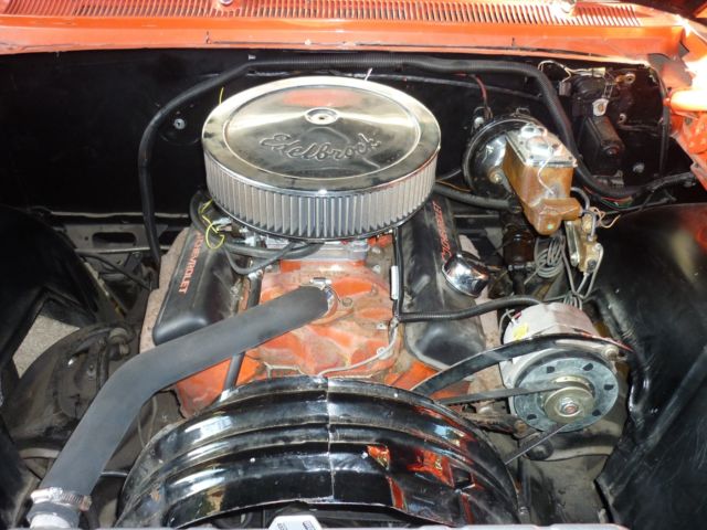 1964 orange pearl Chevrolet Impala 2 door hard top