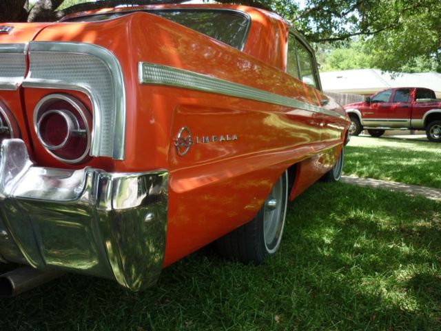 1964 orange pearl Chevrolet Impala 2 door hard top