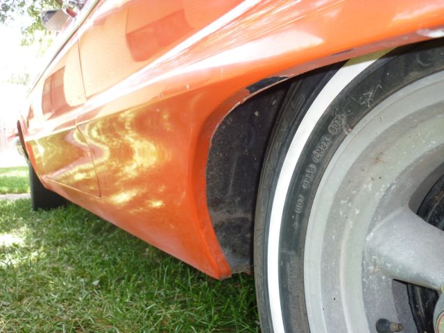 1964 orange pearl Chevrolet Impala 2 door hard top