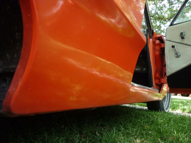 1964 orange pearl Chevrolet Impala 2 door hard top