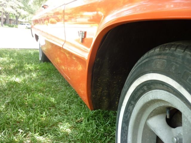 1964 orange pearl Chevrolet Impala 2 door hard top