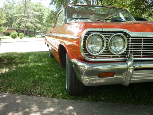 1964 orange pearl Chevrolet Impala 2 door hard top