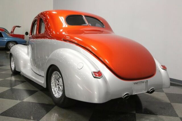 1940 Orange Ford Deluxe Coupe