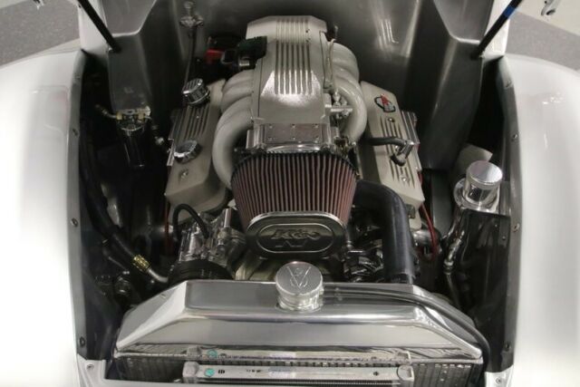 1940 Orange Ford Deluxe Coupe