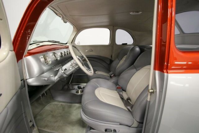 1940 Orange Ford Deluxe Coupe